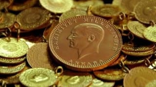 Altın yüksekte tutunuyor, petrol inişte