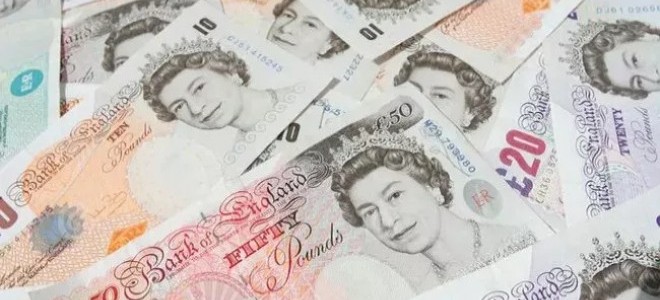 BoE'nin alım programını genişletmesinin ardından tahvil faizleri geriledi