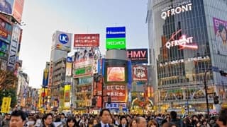 Japonya büyüme ve TÜFE tahminlerini aşağı yönlü revize etti